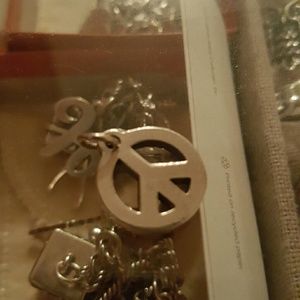 Retired james avery peace sign charm